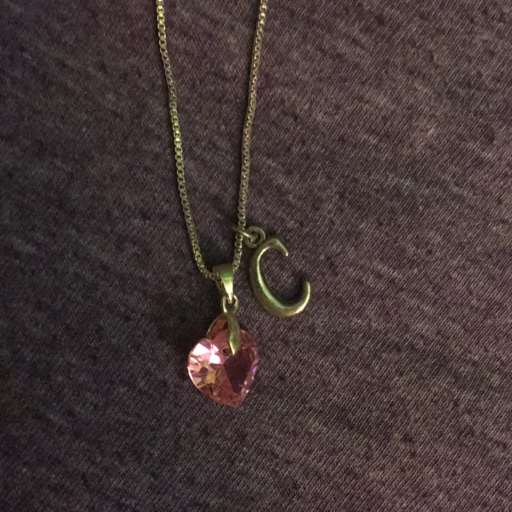 Necklace with Heart and Letter C charm.